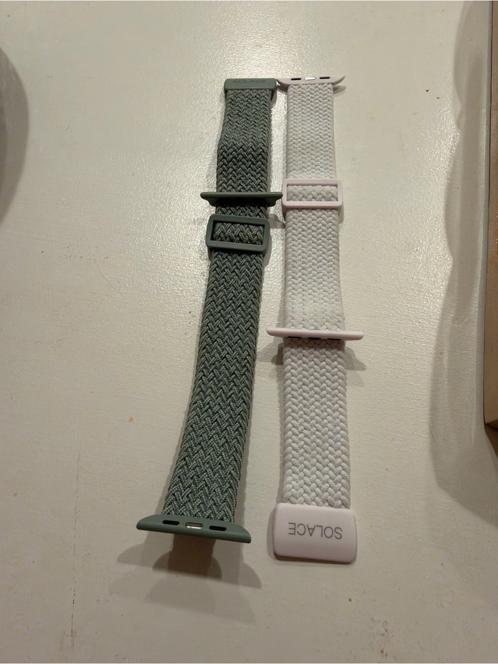 NWOT solace set 2 sport Apple Watch bands in green and white.